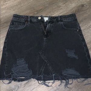 black ripped jean skirt